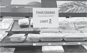  ??  ?? A Kroger in Atlanta was among stores last month that limited meat purchases amid fears of shortages because of illnesses at meatpackin­g plants. JEFF AMY/ AP