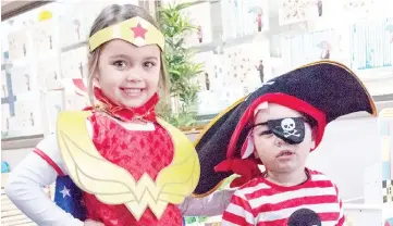  ??  ?? Sister and brother Zara and Oakley Campbell were dressed as Wonder Woman and a pirate for Book Week activities at Waterford Rise Early Learning Centre.