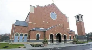  ?? Nate Guidry/Post-Gazette photos ?? The new St. Alexis Catholic Church in McCandless was dedicated in October. Artifacts from closed churches around the Pittsburgh region were incorporat­ed into the new church.