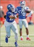  ?? Ron Schwane / Associated Press ?? New York Giants running back Saquon Barkley was held out of action against the Browns.