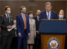  ?? Tasos Katopodis/Getty Images ?? Sen. Joe Manchin, D-W.Va., speaks alongside a bipartisan Congressio­nal group as they announce a proposal for a COVID-19 relief bill on Dec. 1 in Washington, D.C.