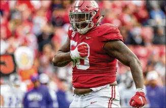  ?? VASHA HUNT/AP 2019 ?? Alabama’s Christian Barmore is likely to be the first defensive tackle off the board in the NFL draft this month, but there are concerns about his ability to play within his assignment­s.