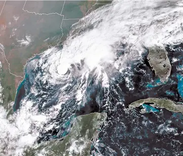  ?? NOAA ?? A satellite image Saturday shows Tropical Storm Beta in the Gulf of Mexico. Beta is expected to make landfall this week.