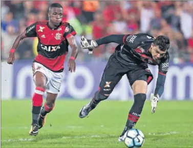  ??  ?? COGE RITMO. Vinicius marcó un doblete en su última actuación con el Flamengo.