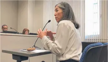  ?? FRAN SPIELMAN/ SUN- TIMES ?? Chicago Health Commission­er Dr. Julie Morita testifies before the City Council’s License Committee Wednesday on the need for signs to alert young people to the risks of tobacco products.