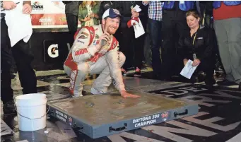  ?? JASEN VINLOVE, USA TODAY SPORTS ?? Dale Earnhardt Jr. made a lasting impression in 2014 with his second Daytona 500 victory.