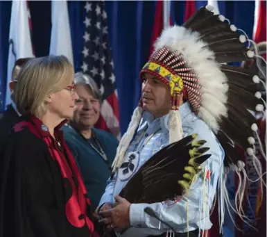  ?? ADRIAN WYLD/THE CANADIAN PRESS ?? Assembly of First Nations Chief Perry Bellegarde speaks with Indigenous and Northern Affairs Minister Carolyn Bennett.