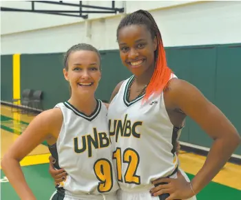  ?? Handout photo ?? Emily Holmes is graduating from the UNBC Timberwolv­es women's basketball program with Maria Mongomo.