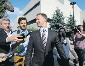  ?? JUSTIN TANG/ THE CANADIAN PRESS ?? Nigel Wright, former chief of staff to Stephen Harper, leaves court in Ottawa on Monday. It can be hard to tell if it’s Sen. Mike Duffy or someone else who’s on trial, writes Christie Blatchford.