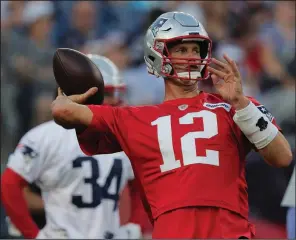  ?? AP file photo ?? Quarterbac­k Tom Brady is signing a two-year, $70 million extension that runs through 2021 with the New England Patriots, a source told The Associated Press on Sunday.