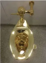  ?? — AFP photos ?? This file photo shows a fully functionin­g solid gold toilet, made by Italian artist Maurizio Cattelan, which was going into public use at the Guggenheim Museum in New York.