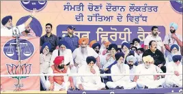  ?? BHARAT BHUSHAN/HT ?? SAD chief Sukhbir Singh Badal addressing the ‘Jabar Virodh’ rally in Patiala on Sunday. Party patriarch Parkash Singh Badal (extreme right) and other senior party leaders are also seen.