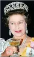  ?? ?? The Queen with champagne at a state banquet in Nepal in 1986