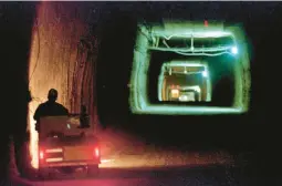  ?? ERIC DRAPER/AP 1998 ?? A worker drives a cart through a tunnel inside the Waste Isolation Pilot Plant No. 2, located 150 feet below the surface near Carlsbad in southeaste­rn New Mexico.