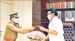  ??  ?? (Left to right): Electoral officials prepare to open postal ballots at a counting centre in Chennai on Sunday; DGP JK Tripathi meets DMK president MK Stalin at his residence; AIADMK party workers watch election results on a big screen at their party headquarte­rs in Chennai.