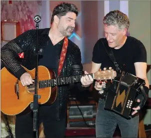  ??  ?? Brian Kennedy and Liam O’Connor in action at the concert at the Church of the Immaculate Conception in Boherbue. Photos: Sheila Fitzgerald