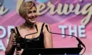  ?? Photograph: Chris Pizzello/Invision/ AP ?? Endearing to the older generation … Greta Gerwig accepts the best director award at the Palm Springs gala on 4 January.