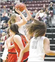  ?? Bud Sullins/Special to Siloam Sunday ?? Siloam Springs sophomore Hailey Dorsey goes up for a shot Friday against Farmington. The Lady Cardinals defeated the Lady Panthers 53-52.