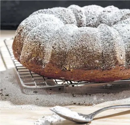  ??  ?? Chai-Spiced Apple Butter Cake is an elegant, understate­d tea cake. For a special occasion, top it with cream cheese frosting.