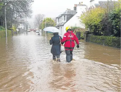  ?? Picture: PPA. ?? Comrie was hit by devastatin­g floods in 2012 and again in 2015.