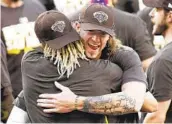  ?? K.C. ALFRED U-T ?? Chris Paddack (right) and Fernando Tatis Jr. celebrate Sept. 20 after Padres clinched a playoff spot.