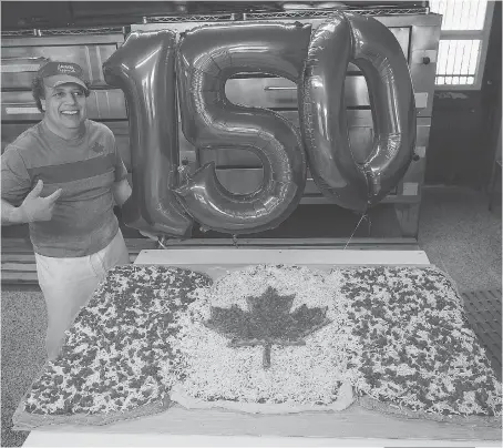  ?? DAN JANISSE ?? Bob Abumeeiz, owner of Arcata Pizzeria, made a huge Canada flag themed pizza on Wednesday and donated it to the Downtown Mission. “I love this country so it was just fun to do this,” Abumeeiz said.