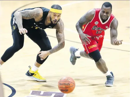  ?? PHOTOS: NICK BRANCACCIO ?? Chris Jones of the Windsor Express, right, is stripped by the Sudbury Five’s Travis Releford in the first quarter of NBL Canada action at the WFCU Centre on Wednesday. Jones led the offence for Windsor with 26 points while Ryan Anderson finished with 24 points.