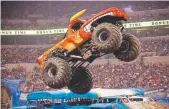  ?? Provided by Fitzgerald Petersen Communicat­ions ?? El Toro Loco soars above a line of buses ata2016 Monster Jam show.