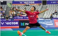  ?? AFP ?? Anthony Sinisuka Ginting returns a shot against South Korea’s Son Wan-Ho during their men’s singles semifinal. —