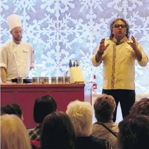  ?? DONNA CHRISTENSE­N ?? Vikram Vij demonstrat­es a selection of his recipes during cooking sessions.