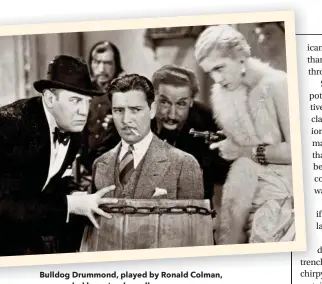  ??  ?? Bulldog Drummond, played by Ronald Colman, surrounded by ne’er-do-wells