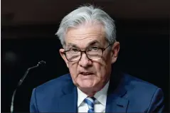  ?? ANDREW HARNIK — THE ASSOCIATED PRESS ?? The policy shift reflects an acknowledg­ement by Federal Reserve Chairman Jerome Powell that with inflation pressures rising, the Fed needs to begin tightening credit for consumers and businesses faster than he had thought just a few weeks earlier.