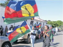  ?? AFP ?? New Caledonian­s protest against changes to voting rules proposed by the central government in Paris on Tuesday.