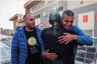  ?? — AFP ?? Relatives and friends mourn the death of Saif Abu Taha, a staff member of the Us-based aid group World Central Kitchen, who was killed as Israeli strikes hit a convoy of the NGO delivering food aid in Gaza.