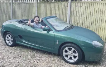  ?? PICTURE: LAWRENCE HOWARD ?? Lawrence Howard in his green 2002 MG TF