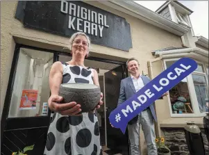  ??  ?? Castlegreg­ory craftworke­r Colleen Bowler and Brian McGee of the Design & Crafts Council launching the ‘Made Local’ campaign in the Original Kerry shop on Green Street.