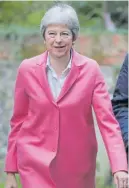  ??  ?? Mrs May goes to church yesterday