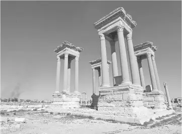  ?? — Reuters photo ?? File photo shows the Tetrapylon, one of the most famous monuments in the ancient city of Palmyra, in Homs Governorat­e, Syria.