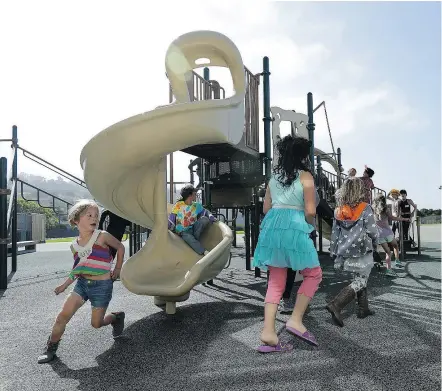  ?? — PHOTOS: THE ASSOCIATED PRESS ?? Children play at Bay Area Rainbow Day Camp in El Cerrito, Calif. Organizers say the camp gives kids a safe, fun place to be themselves. The camp’s enrolment has tripled since it opened in 2015, and plans are underway to open a branch next summer in...