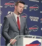  ?? JOHN WAWROW THE ASSOCIATED PRESS ?? Quarterbac­k A.J. McCarron speaks to the media after his arrival at Buffalo Bills headquarte­rs this week.