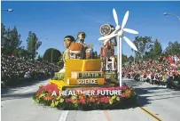  ?? MICHAEL OWEN BAKER/ASSOCIATED PRESS ?? The Kaiser Permanente float makes its way along the route Saturday at the Rose Parade. The floral spectacle didn’t happen last year due to restrictio­ns from the coronaviru­s pandemic.