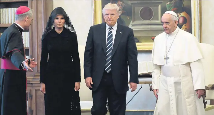  ?? Pictures / AP ?? The Vatican squeezed in the meeting, with Melania and Donald Trump arriving to meet Pope Francis at 8.30am local time.