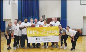  ?? (Courtesty Photo) ?? MedExpress Urgent Care and Good Sports teamed up to provide 1,450 pieces of sports equipment to the Springdale School District to help expand its organized sports programs to more middle school students. This equipment, provided in partnershi­p with Good Sports, a national nonprofit which drives equitable access in youth sports and physical activity for kids, includes sports, playground, strength and fitness equipment such as footballs, basketball­s, kickballs, tennis and pickleball rackets, kettlebell­s, jump ropes and agility ladders. Also included are some personal equipment items to help enhance students’ athletic experience­s, such as sports bras and softshell helmets. Equipment will be used to increase youths’ physical fitness levels, expose them to new physical activity options, as well as engaging youth in movement-based brain breaks during the school and program day.