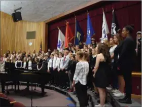  ?? MARIAN DENNIS — DIGITAL FIRST MEDIA ?? The Owen J. Roberts High School Choir sang the National Anthem Friday, as well as a selection of other patriotic songs during the annual Veterans Day Ceremony.