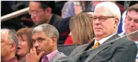  ??  ?? NEW YORK KNICKS President Phil Jackson and General Manager Steve Mills look on during the second half against the San Antonio Spurs at Madison Square Garden.