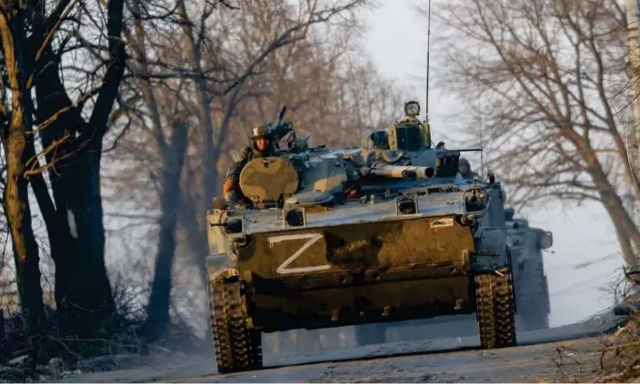  ?? ?? Russian soldiers are seen on a tank in Volnovakha, Ukraine. Photograph: Anadolu Agency/Getty Images