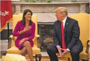  ?? CALLA KESSLER/WASHINGTON POST ?? President Donald Trump praised U.N. ambassador Nikki Haley for ‘an incredible job’ when he announced she’s resigning at the end of the year.