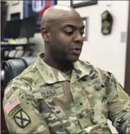  ?? CHRISTINA MYERS—ASSOCIATED PRESS ?? In this Feb. 25, 2019photo, Brig. Gen. Beagle reflects on memories of his great grandfathe­r in his office on Fort Jackson’s base, which is located near where African American soldiers were housed during WWI when thenCamp Jackson was segregated.