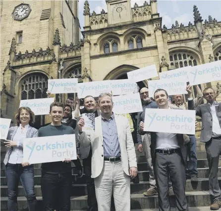  ??  ?? 0 Yorkshire Party leader Stewart Arnold (centre) launches the party’s 2017 manifesto outside Wakefield Cathedral. Picture: Scott Merrylees/ Johnston Press