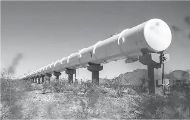  ?? JOE BUGLEWICZ / THE NEW YORK TIMES ?? A section of hyperloop tube at the Virgin Hyperloop One test centre in Moapa, Nev. The system would put passengers in pods hurtling through vacuum-like tubes. Other companies are moving ahead with similar plans.